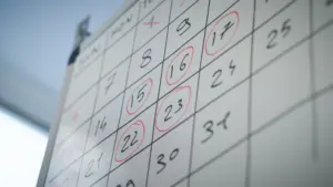 Calendar marked with health screening dates, planning a check-up schedule