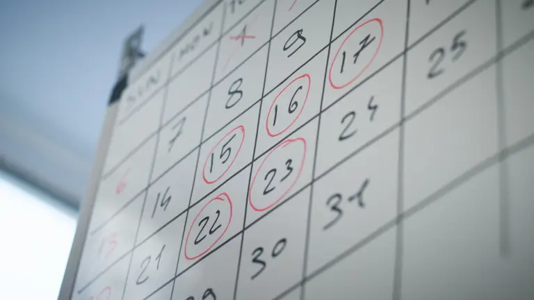 Calendar marked with health screening dates, planning a check-up schedule