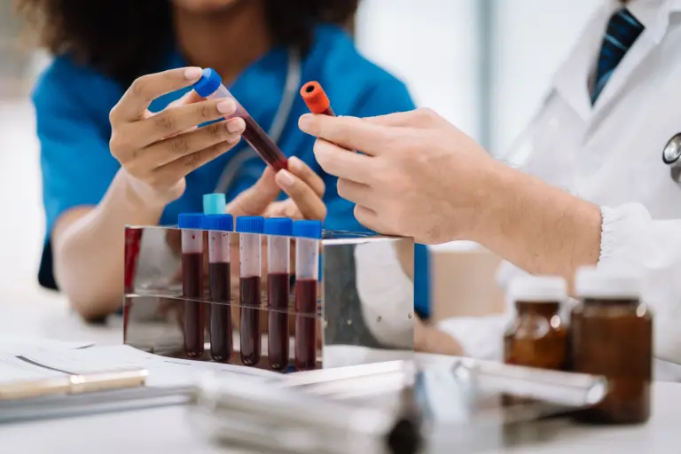 Medical team reviewing blood test results for fertility hormone markers